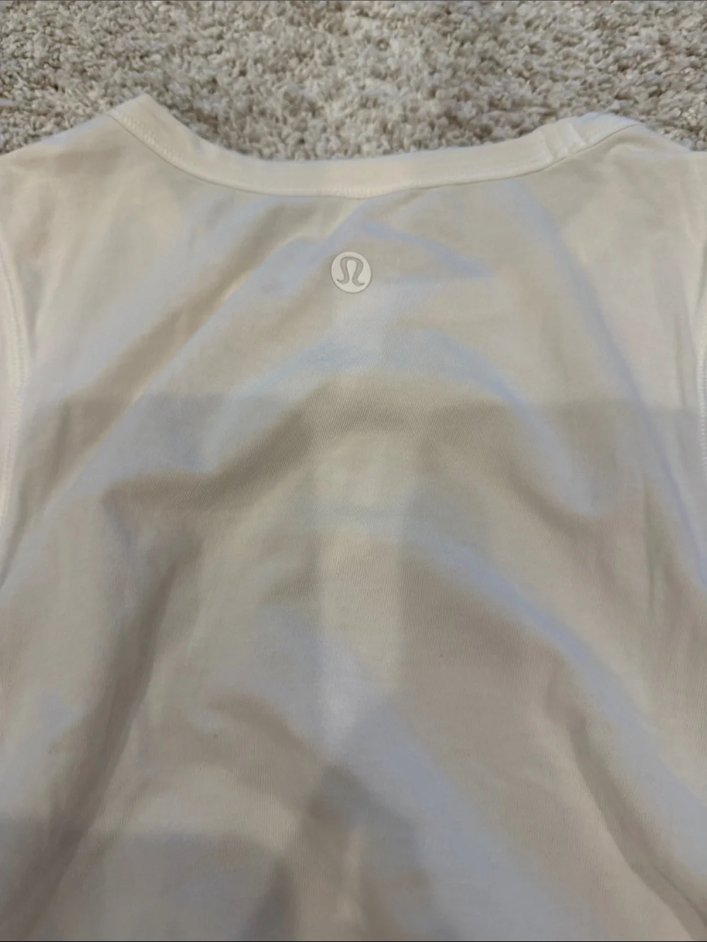Lululemon white cinch side tank size 2. Great condition.
